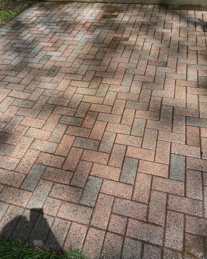 spotless backyard patio after being pressure washed in Bergen County